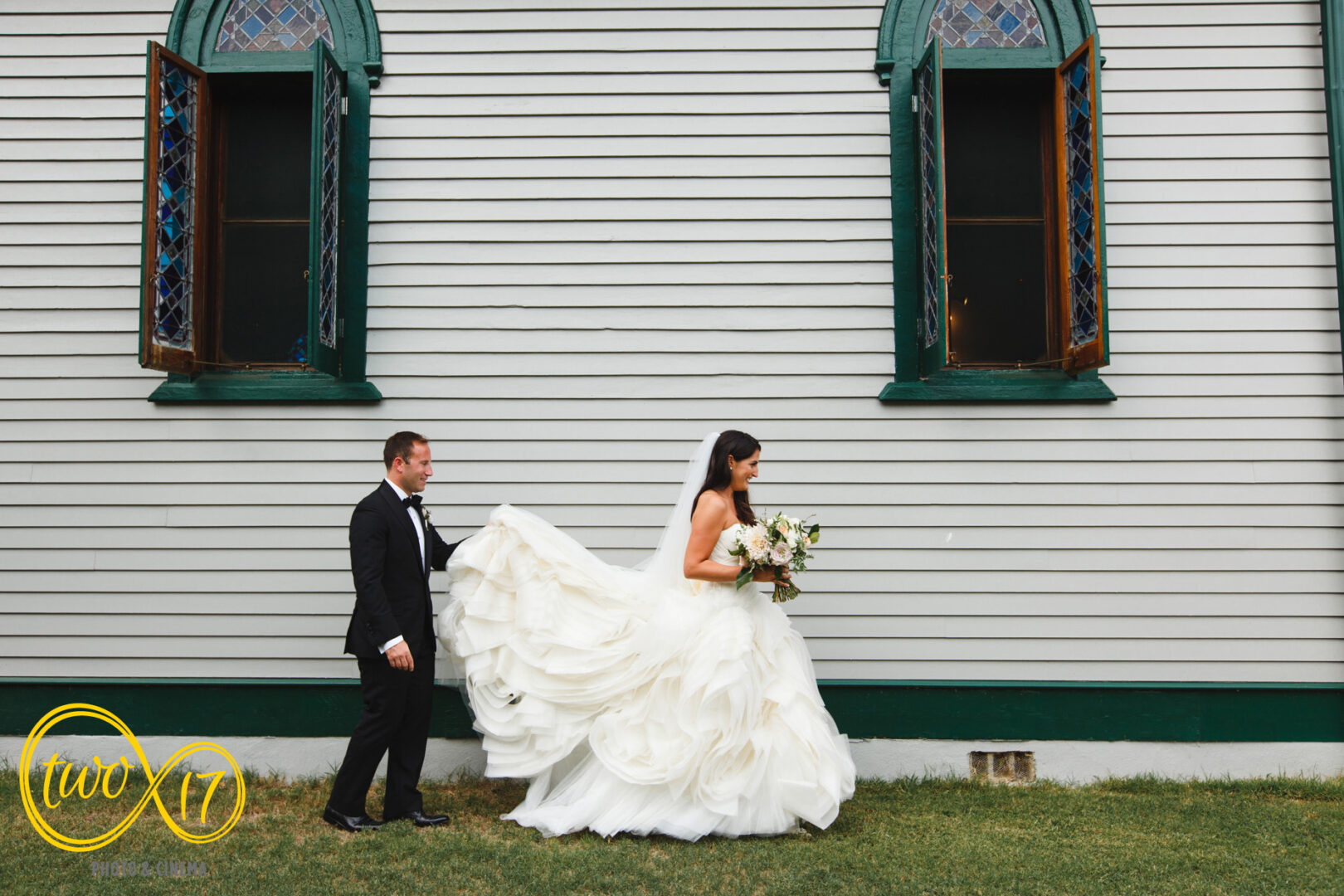 portrait of bride and groom leaving their wedding ceremony church in Cape May, New Jersey.