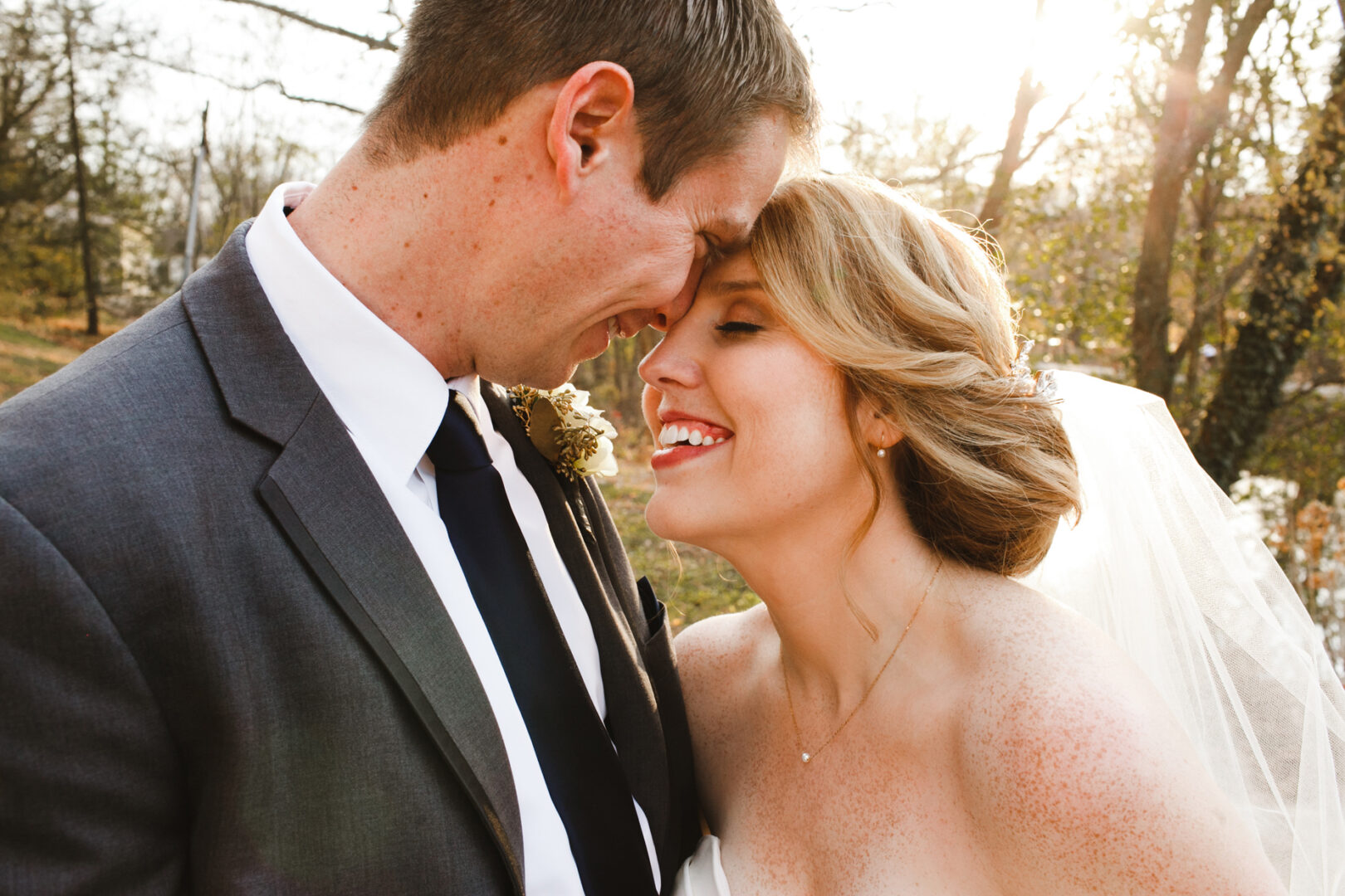 In Phoenixville, a bride and groom share a moment alone along the canal path during their wedding day.
