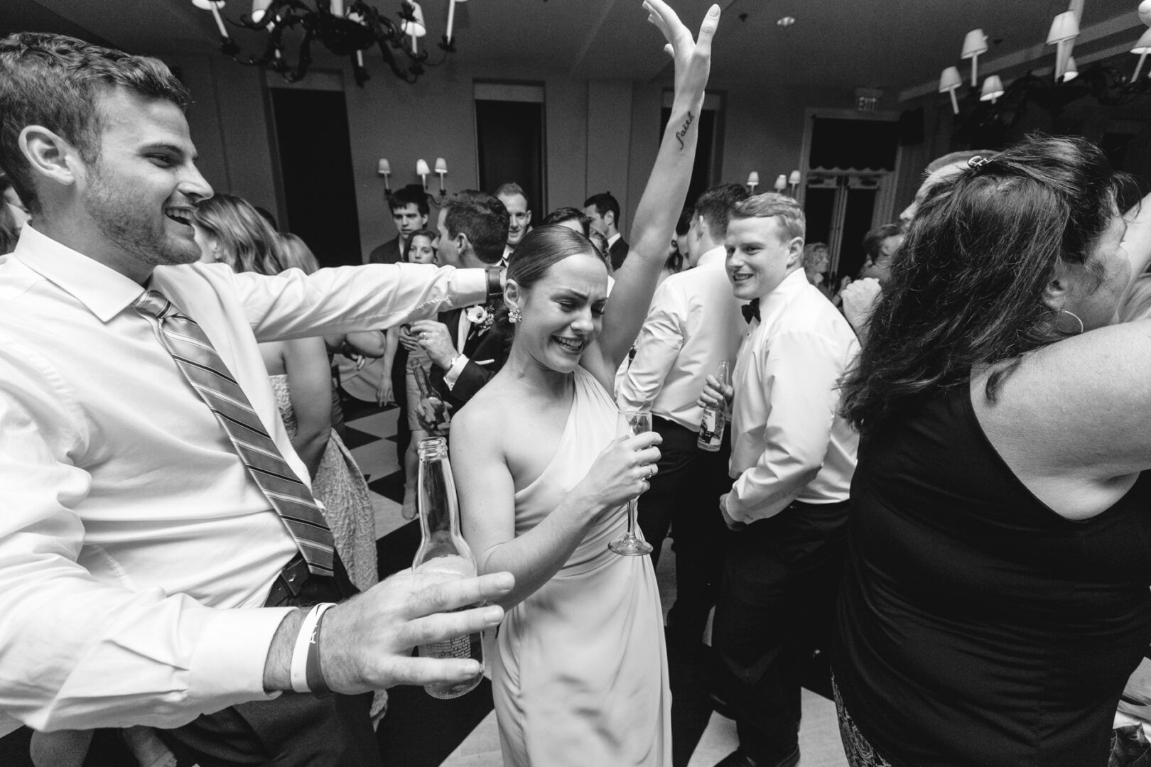 In the elegant setting of Congress Hall, guests in formal attire danced joyously, celebrating with infectious energy.