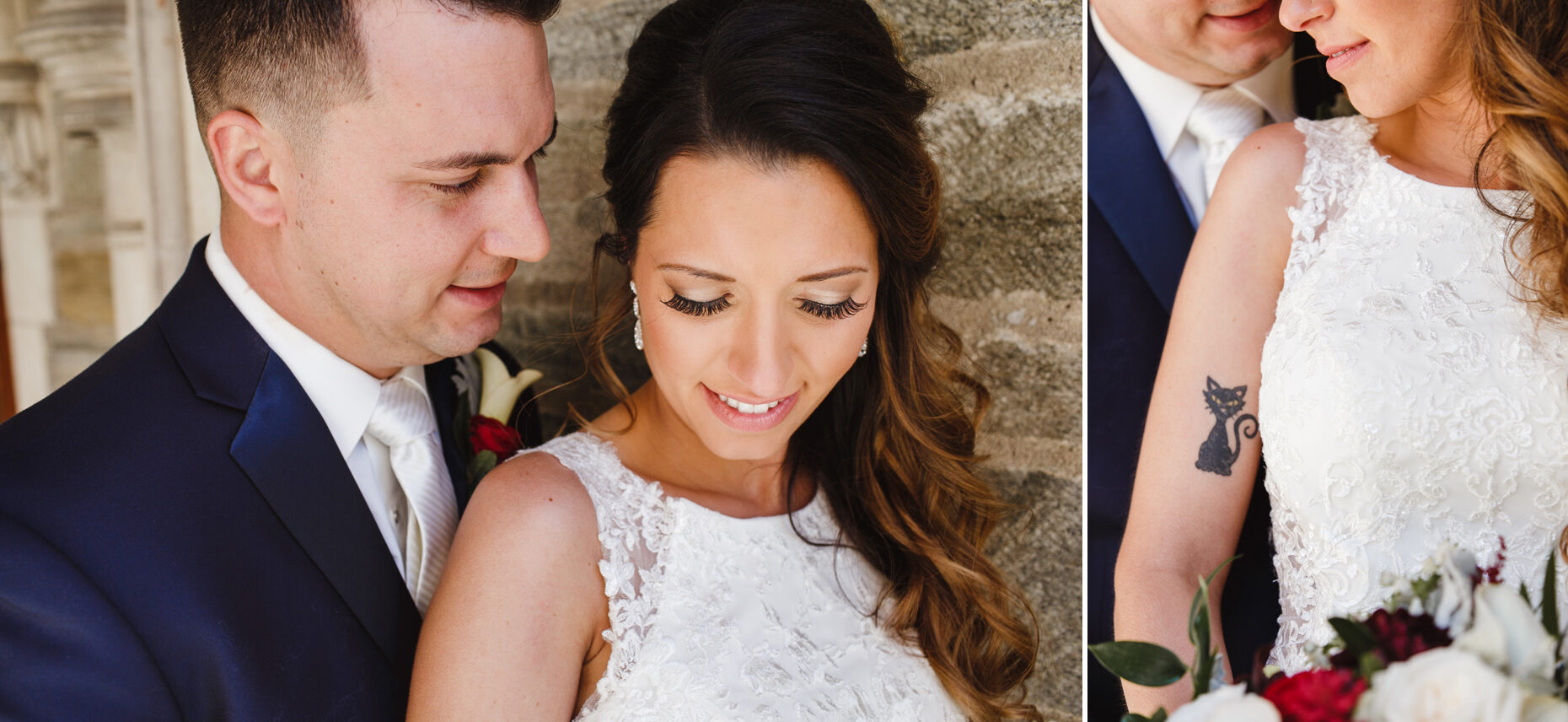 A couple in formal attire stands together at a Windsor Ballroom wedding, the woman with curled hair and a lace dress, revealing a cat tattoo on her arm. They appear in close proximity, both facing downward slightly.