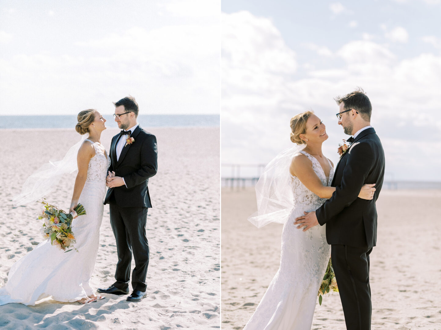 A bride and groom stand on a beach in Cape May, dressed in formal attire, embracing and gazing into each other's eyes. The bride clutches a bouquet, while the sky above is partly cloudy, adding to their perfect wedding day backdrop.