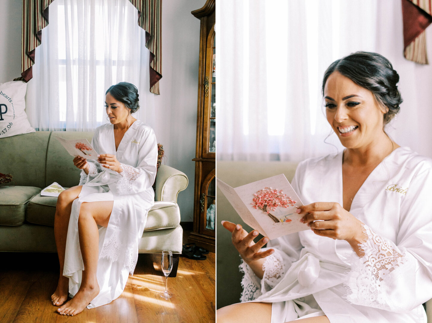 In a luxurious suite at the Mansion on Main Street, a woman in a white robe embroidered with "bride" sits elegantly on a couch, reading an intimate card. Beside her, a champagne glass rests on the floor, capturing the essence of this unforgettable moment before wedding photos are taken.