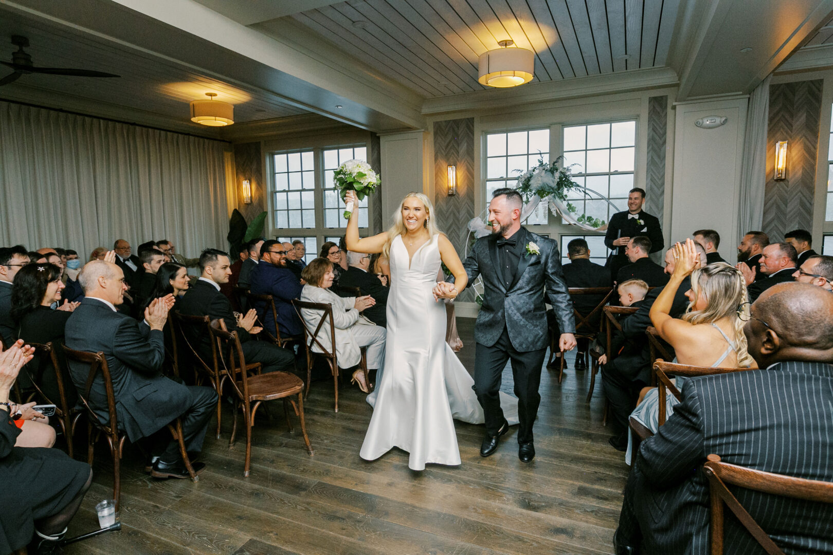 Caitlin & Matt recess down the aisle after their Philadelphia wedding ceremony in New Hope.