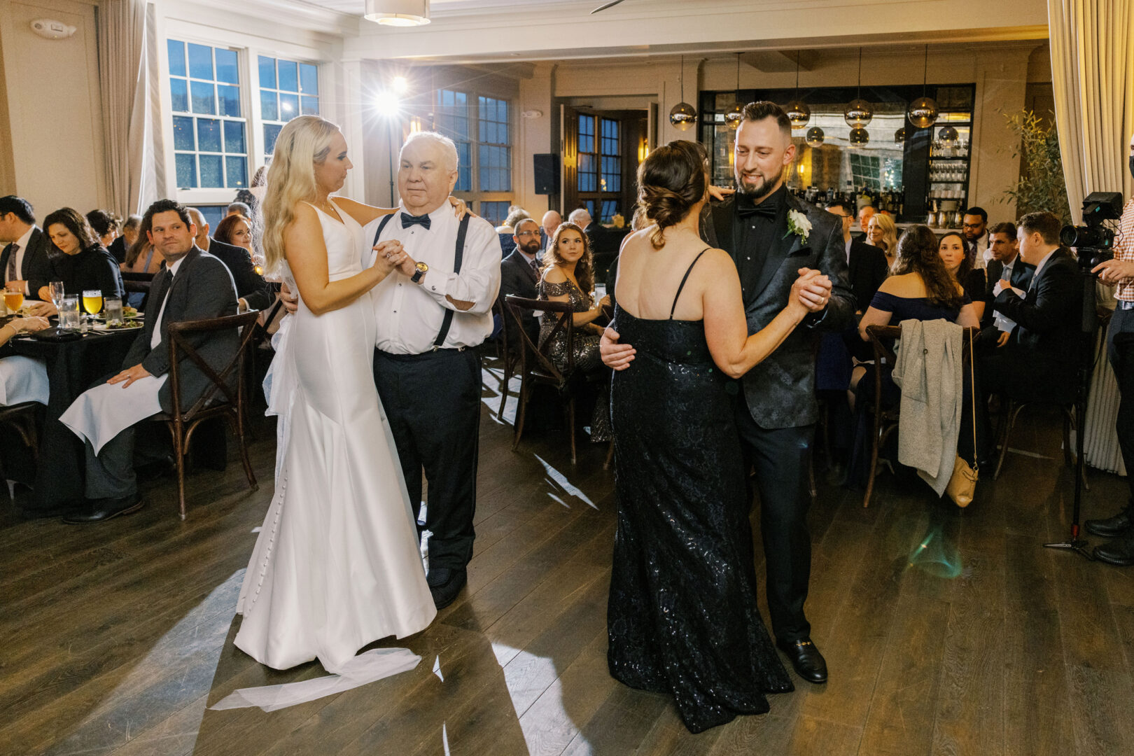 Parent dances at a wedding in Philadelphia by Two17 Photo & Cinema.