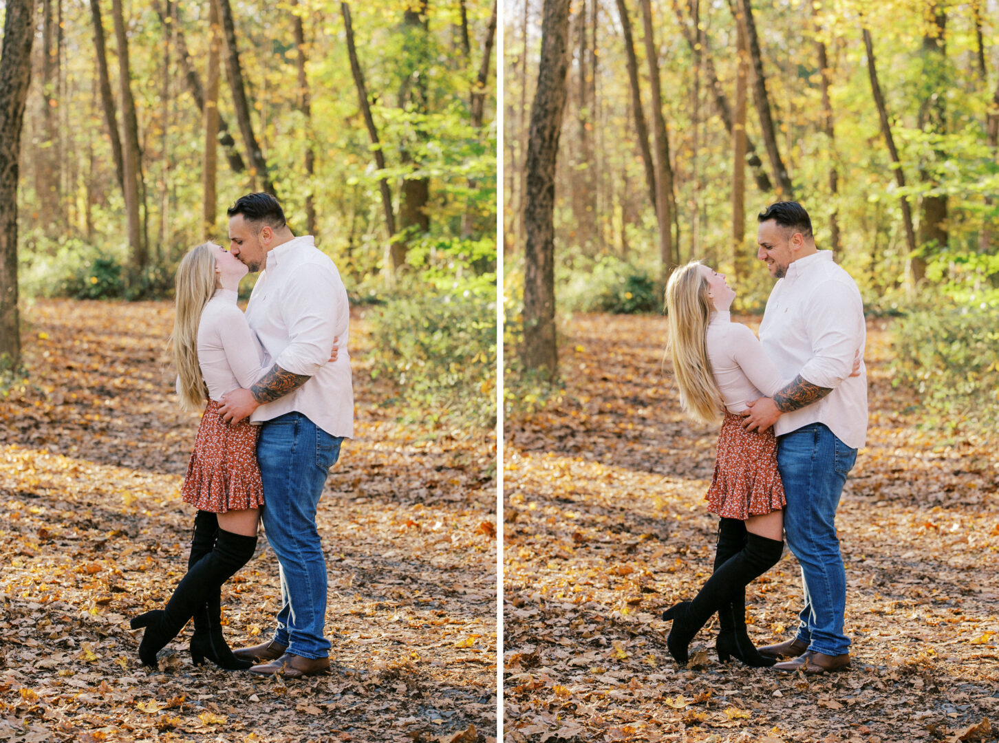 A couple stands and embraces in a forest during autumn, both smiling at each other. They are dressed in casual clothing, surrounded by fallen leaves and tall trees, with a picturesque covered bridge in the background—an ideal setting for their engagement session.