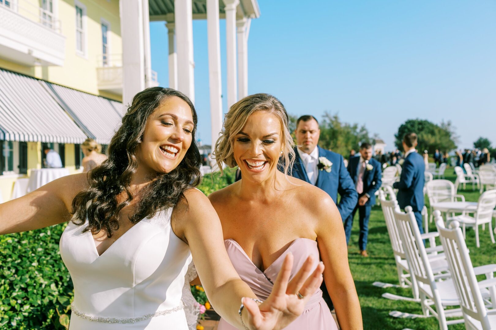 A recently married bride shows off her wedding ring after the ceremony in Cape May.