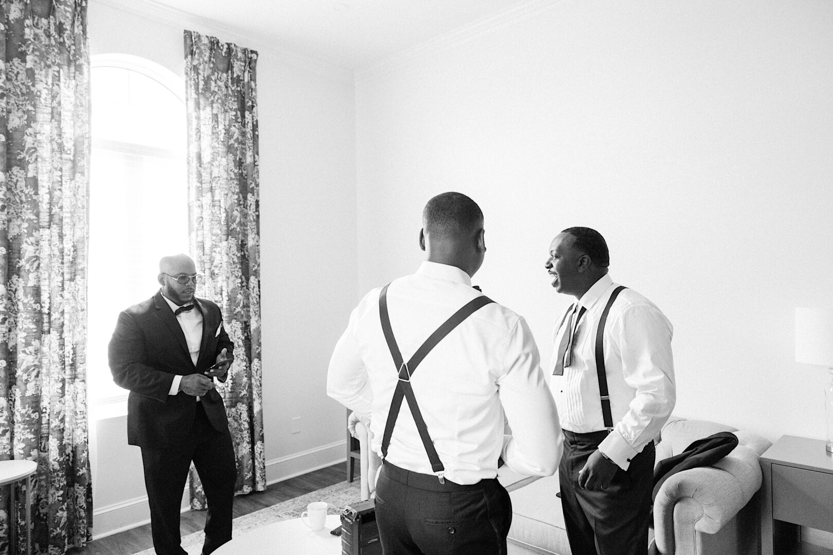 Groomsmen get ready for a wedding at Renault Winery.