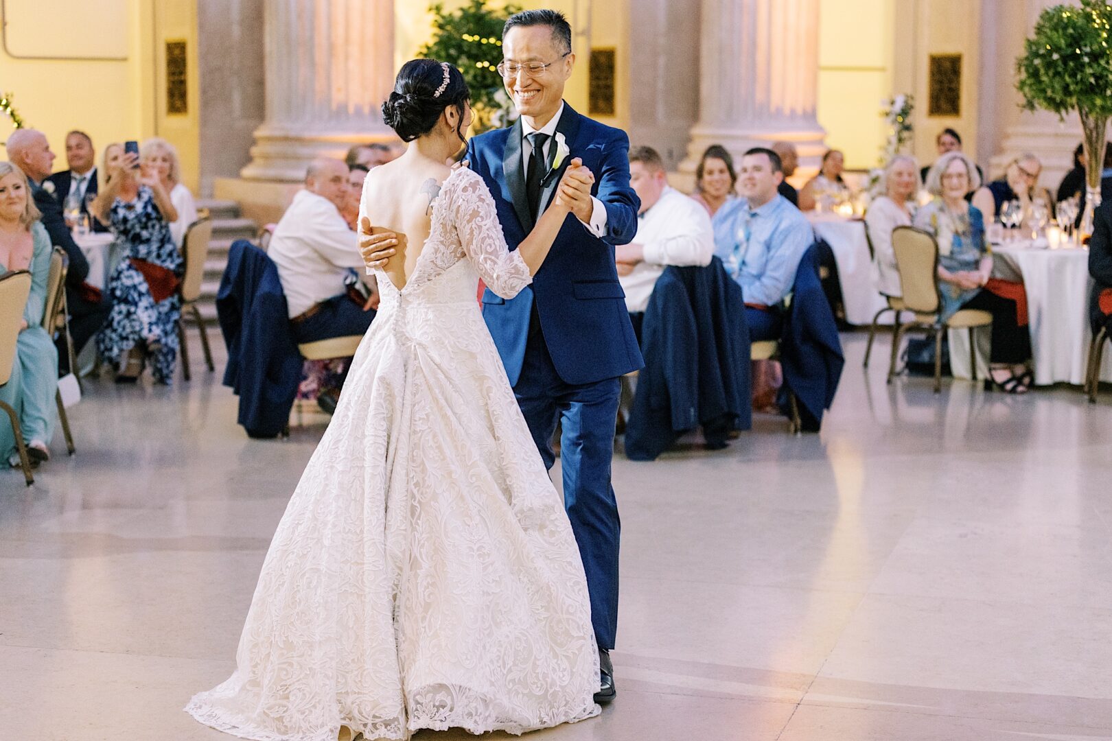 Bride dancing with her Dad at her modern wedding at the Franklin Institute