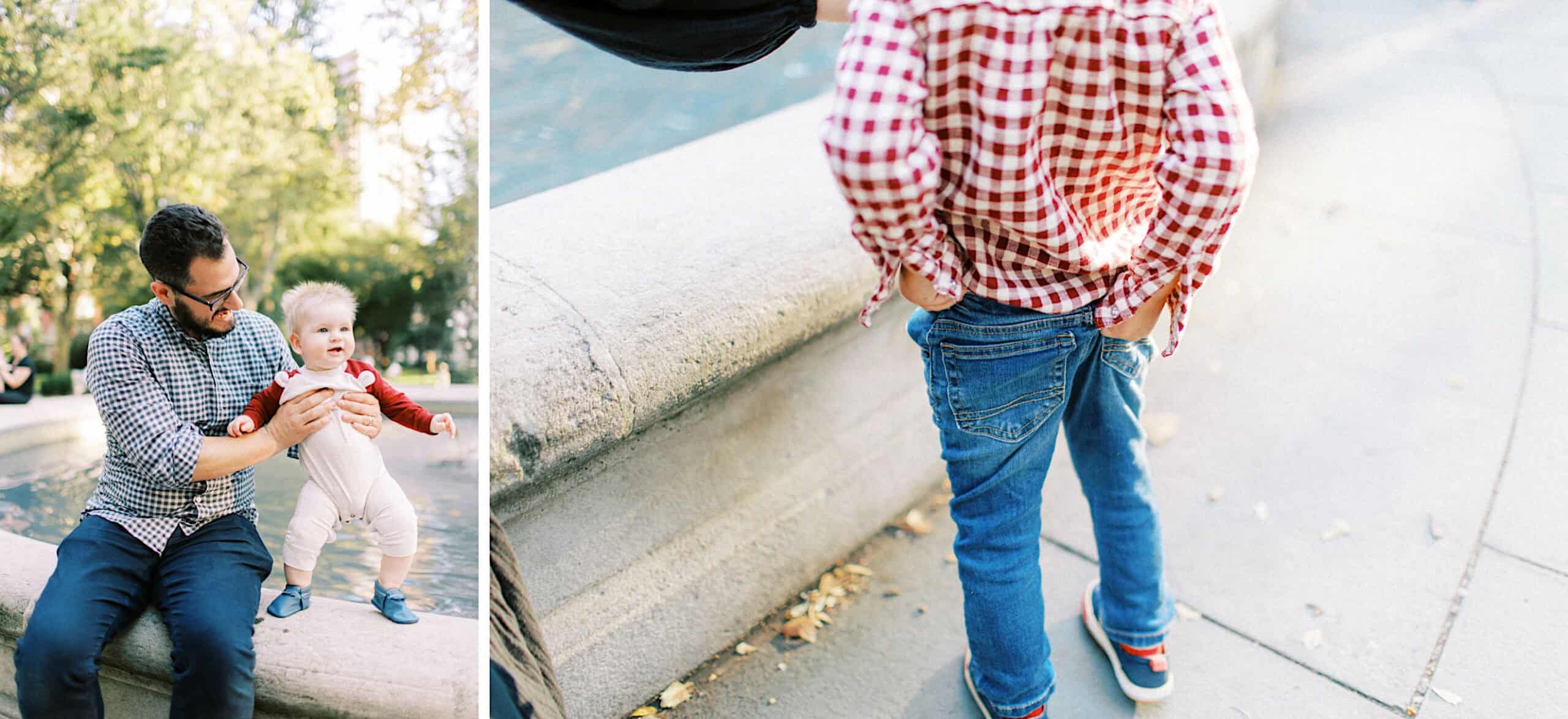 A man helps a baby stand on a stone ledge in a park, while another child in jeans and a red-checkered shirt stands nearby—capturing sweet family photos at Washington Square in Philadelphia.