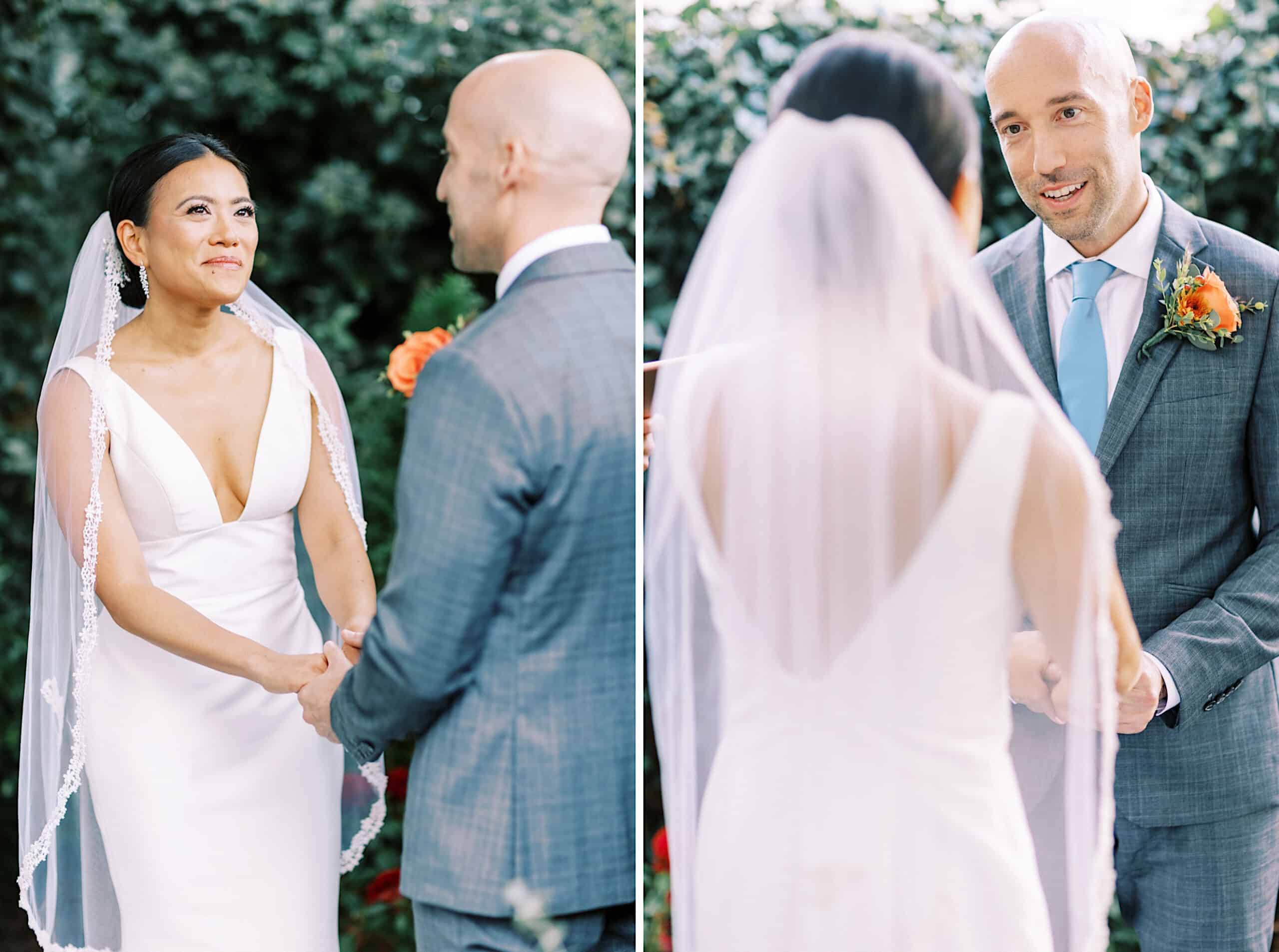 Two people in wedding attire hold hands and face each other during an outdoor Cape May wedding at the Virginia Hotel; one wears a veil and white dress, the other a grey suit with a blue tie and orange boutonniere.