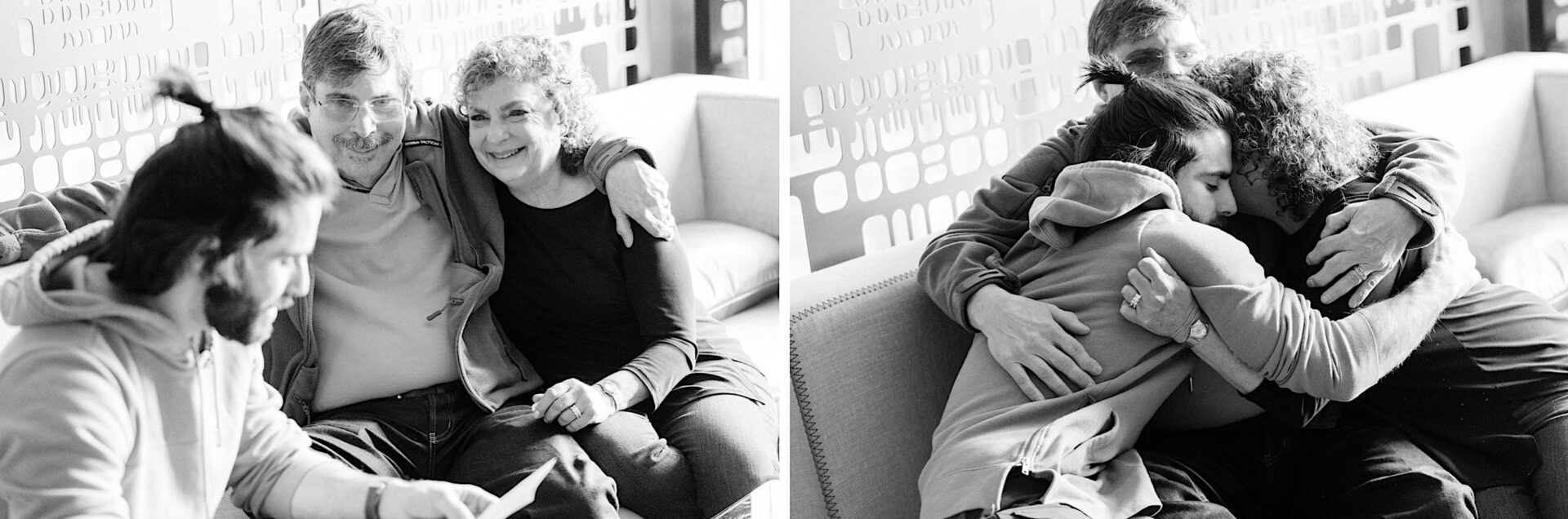A group of three adults sits close together on a couch in Philadelphia. Two images depict them from different angles, showing an embrace and smiling faces. One person has a ponytail, one wears glasses, and one has curly hair. It feels like the warmth of New Year's Eve celebrating their bond.