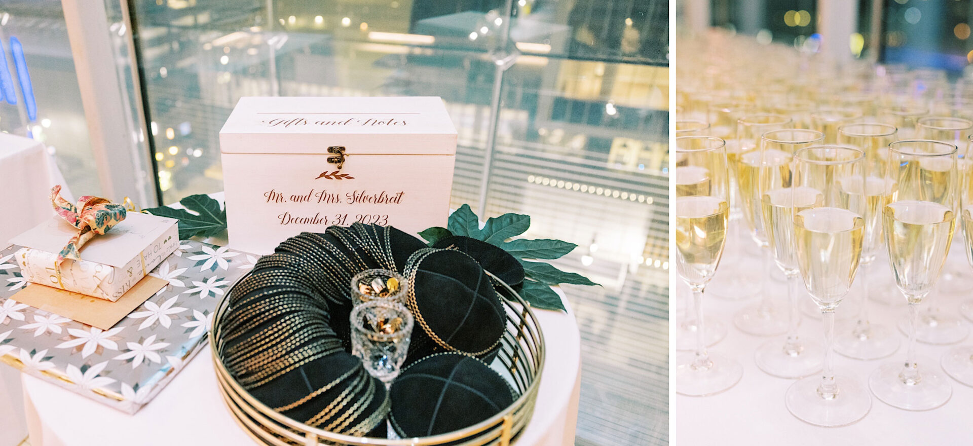 A table with wrapped gifts, a white box labeled "Gifts and Slots," and a tray of beaded bracelets graces the event. Nearby, a display of filled champagne glasses adds to the festive atmosphere, perfectly capturing the elegance of a Philadelphia wedding at the Kimmel Center.