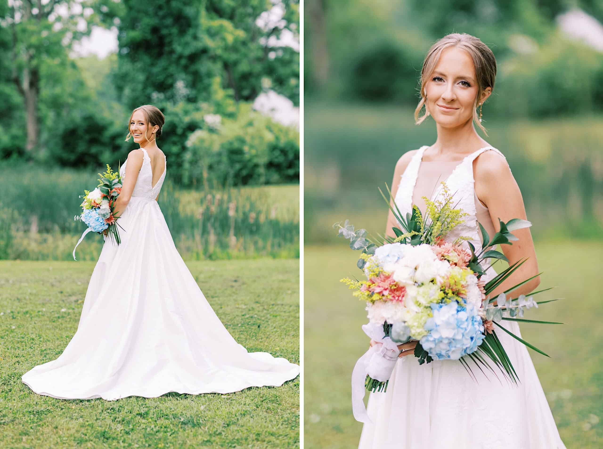 A bride in a white dress stands outdoors at her Summer Wedding at The High Point, holding a colorful bouquet with greenery and trees in the background.