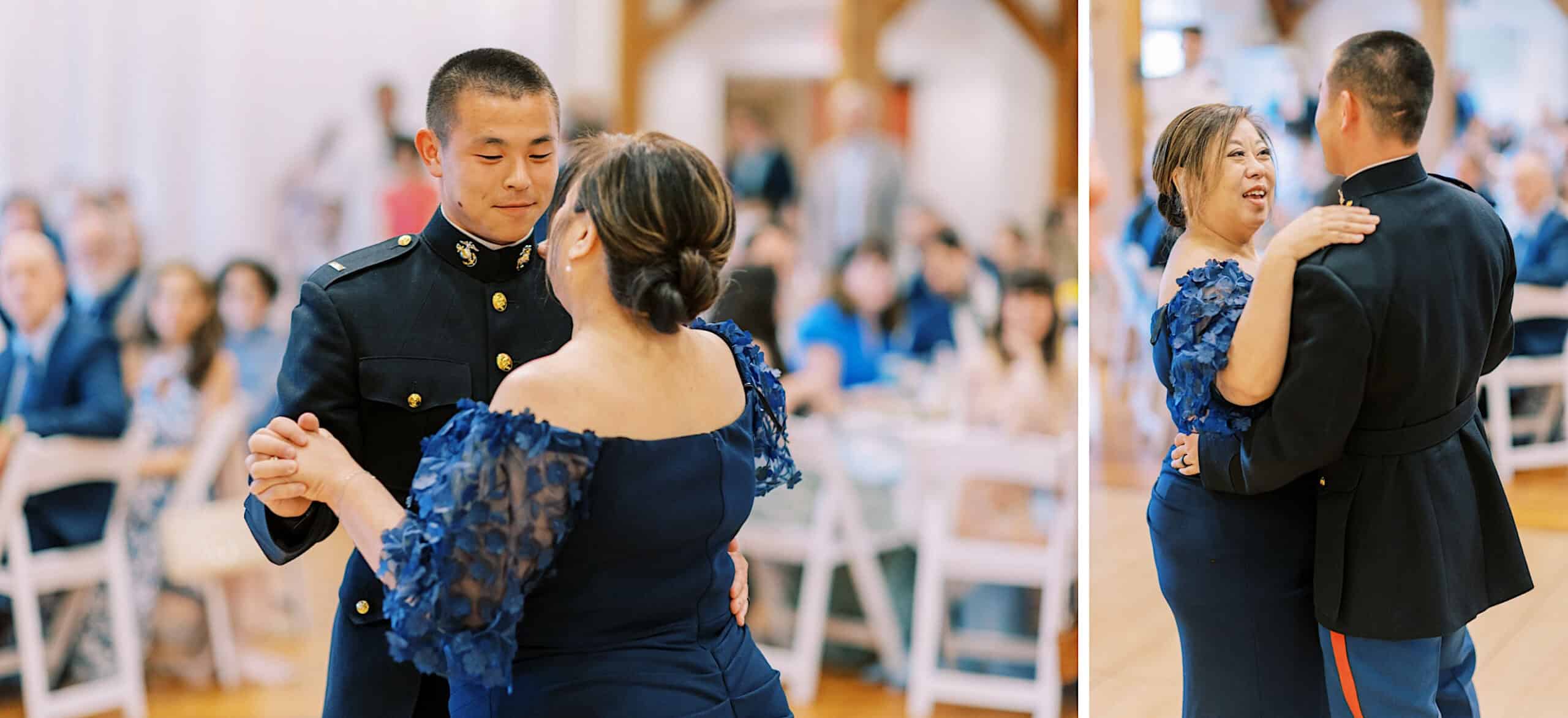 At a Summer Wedding at The High Point, a man in a military uniform dances with a woman in a blue dress, while seated guests watch in the background.