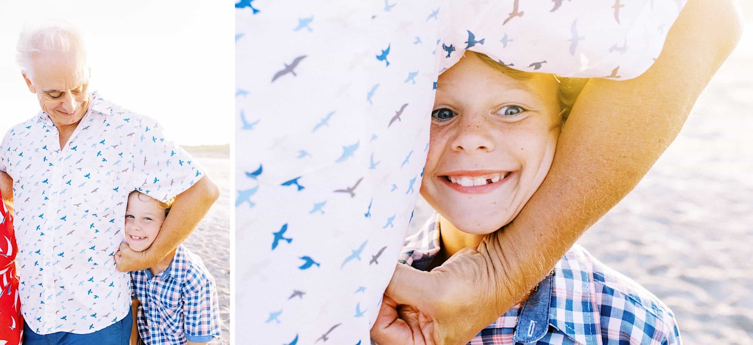 An older man hugs a smiling young boy on the beach in this Jersey Shore Family Photos moment. The boy’s face is framed by the man's arm, and both wear patterned shirts.