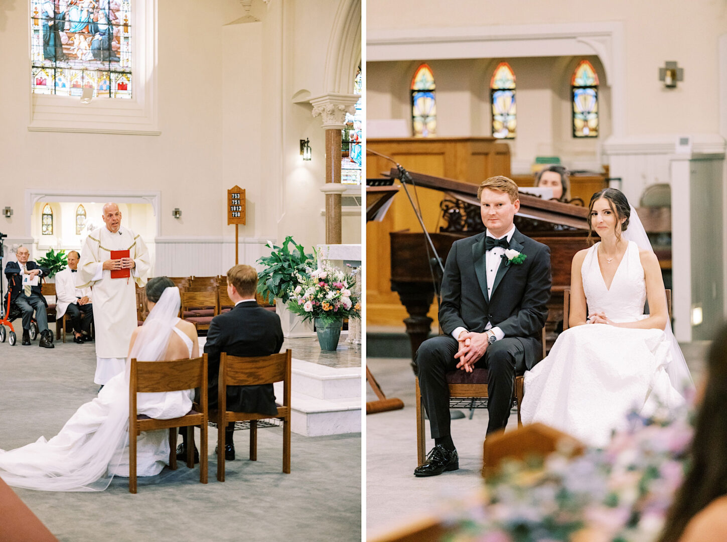 A couple sits in a church during their Philadelphia wedding ceremony. The officiant stands at the altar. Stained glass windows are visible in the background, adding to the romantic ambiance.