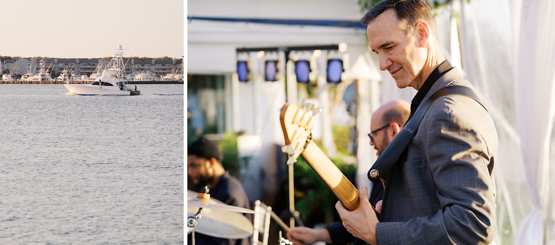 At a Corinthian Yacht Club of Cape May wedding, a man in a suit strums his guitar beside a drummer outdoors, with the serene waterfront as their stage. A boat and buildings serve as the picturesque backdrop for this enchanting musical moment.