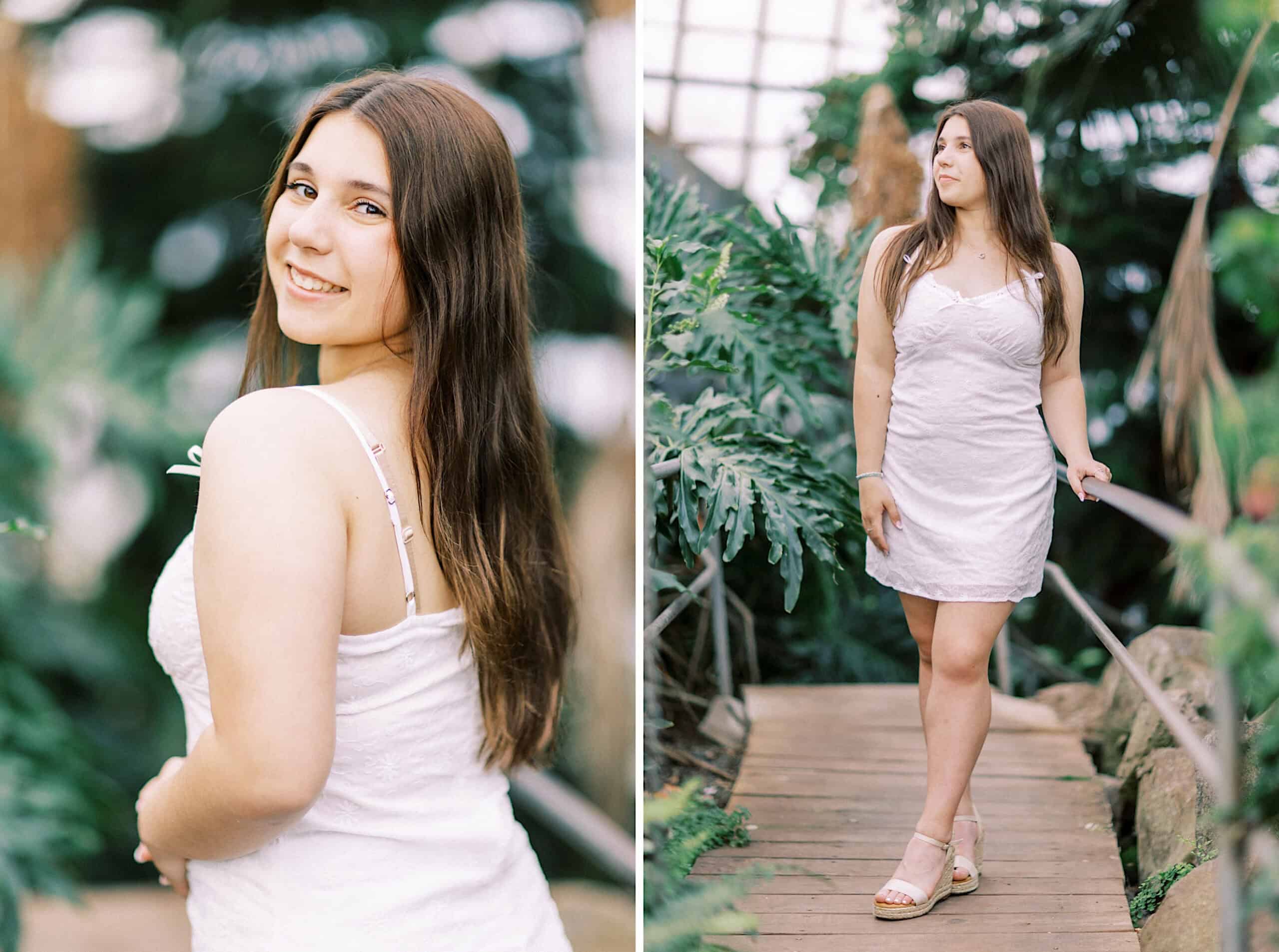 A young woman with long brown hair wearing a white dress stands on a wooden pathway surrounded by lush green plants during her Senior Portrait Session in Montgomery County, smiling in one photo and looking to the side in the other.