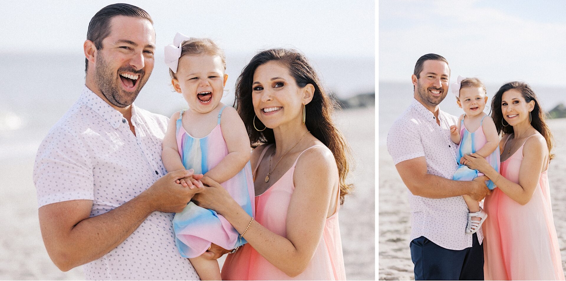 A man, woman, and young girl stand and smile together on a sandy beach, dressed in light-colored summer clothing.