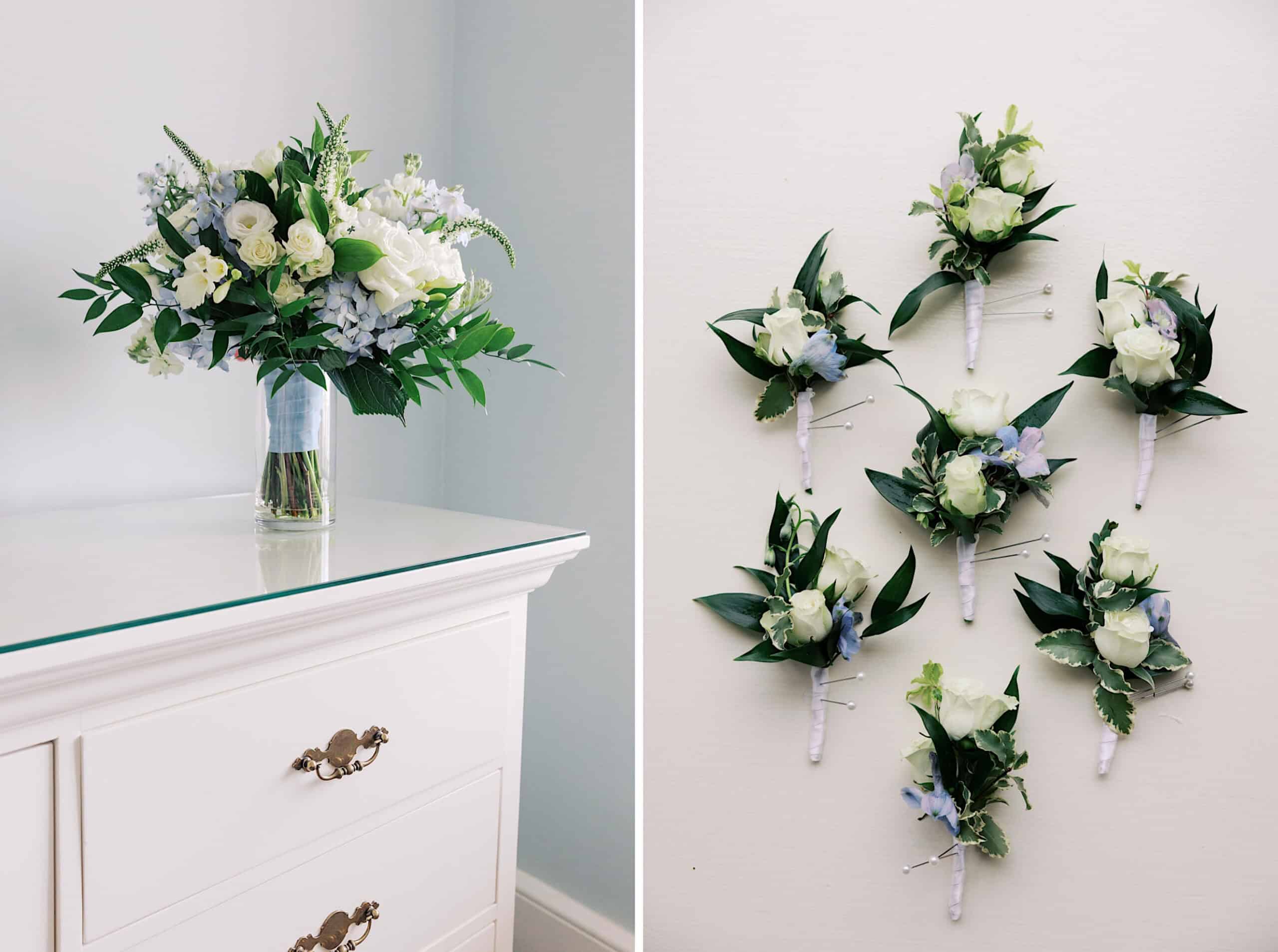 A vase of white and green flowers sits on a white dresser; beside it, seven small matching floral boutonnieres are arranged—perfect for a New Jersey Beach Wedding Venue.