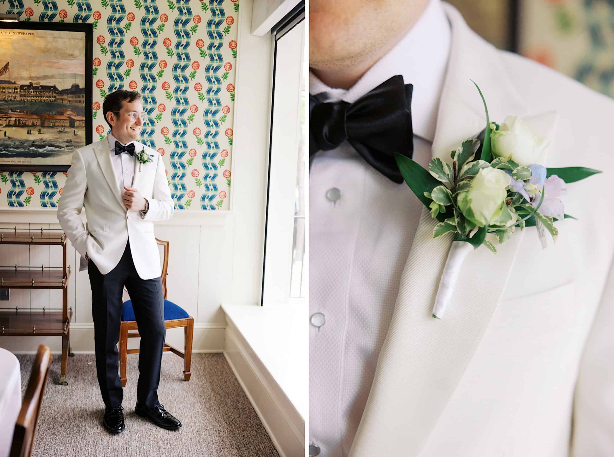 A man in a white tuxedo jacket with a black bow tie stands indoors at a New Jersey Beach Wedding Venue; close-up shows a white rose boutonniere pinned to his lapel.