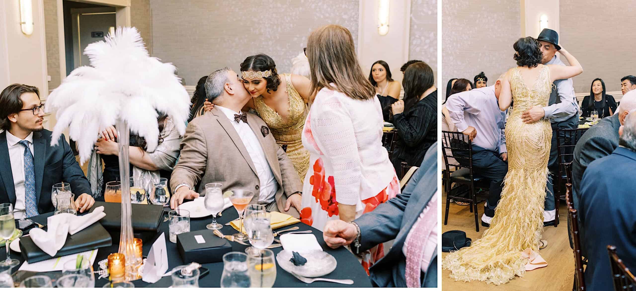 A woman in a gold dress greets a seated man at a Great Gatsby Sweet 16, set with black tablecloths and white feather centerpieces; guests are seated and socializing.