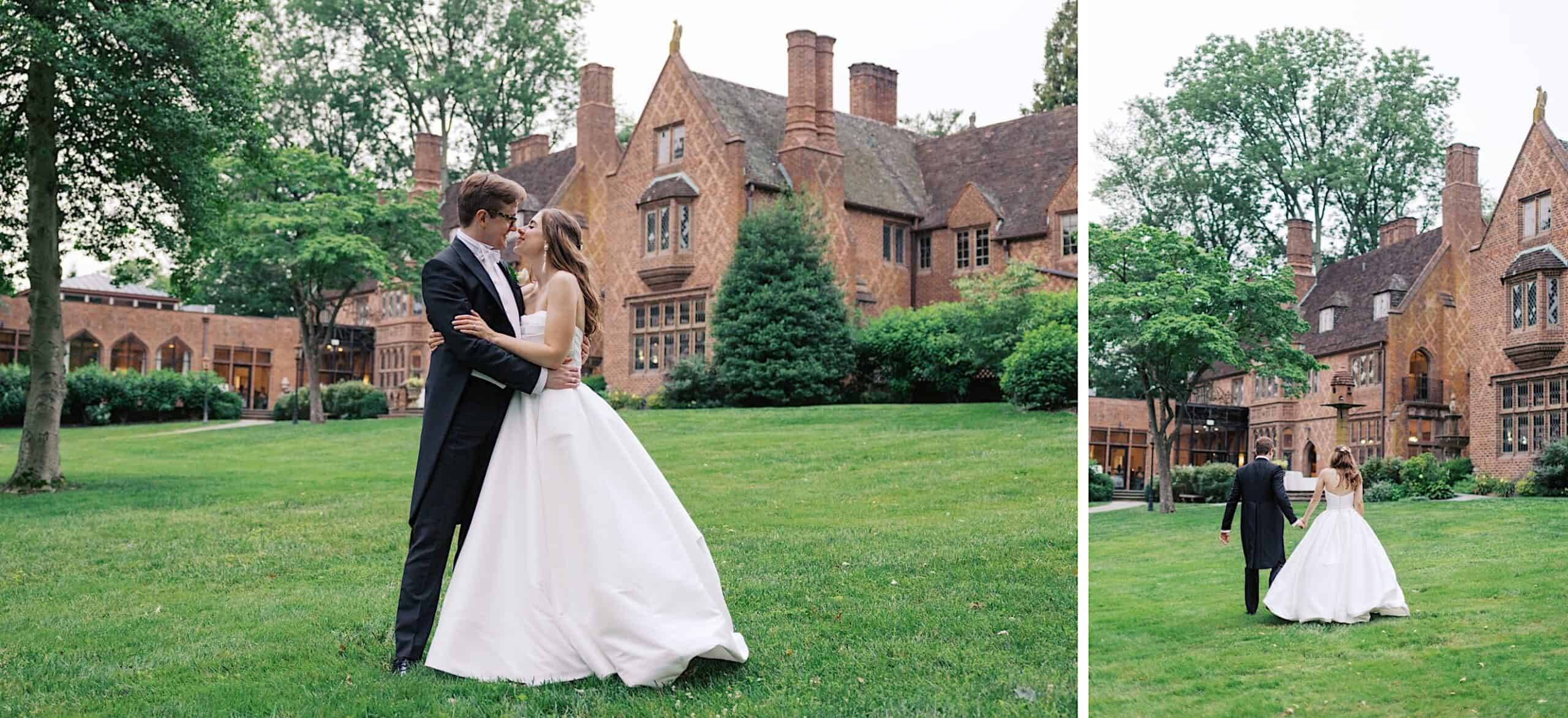 A bride and groom stand together on a lawn in front of the large brick Aldie Mansion, dressed in formal wedding attire, with trees and greenery surrounding them—capturing a classic Wedding at Aldie Mansion moment.