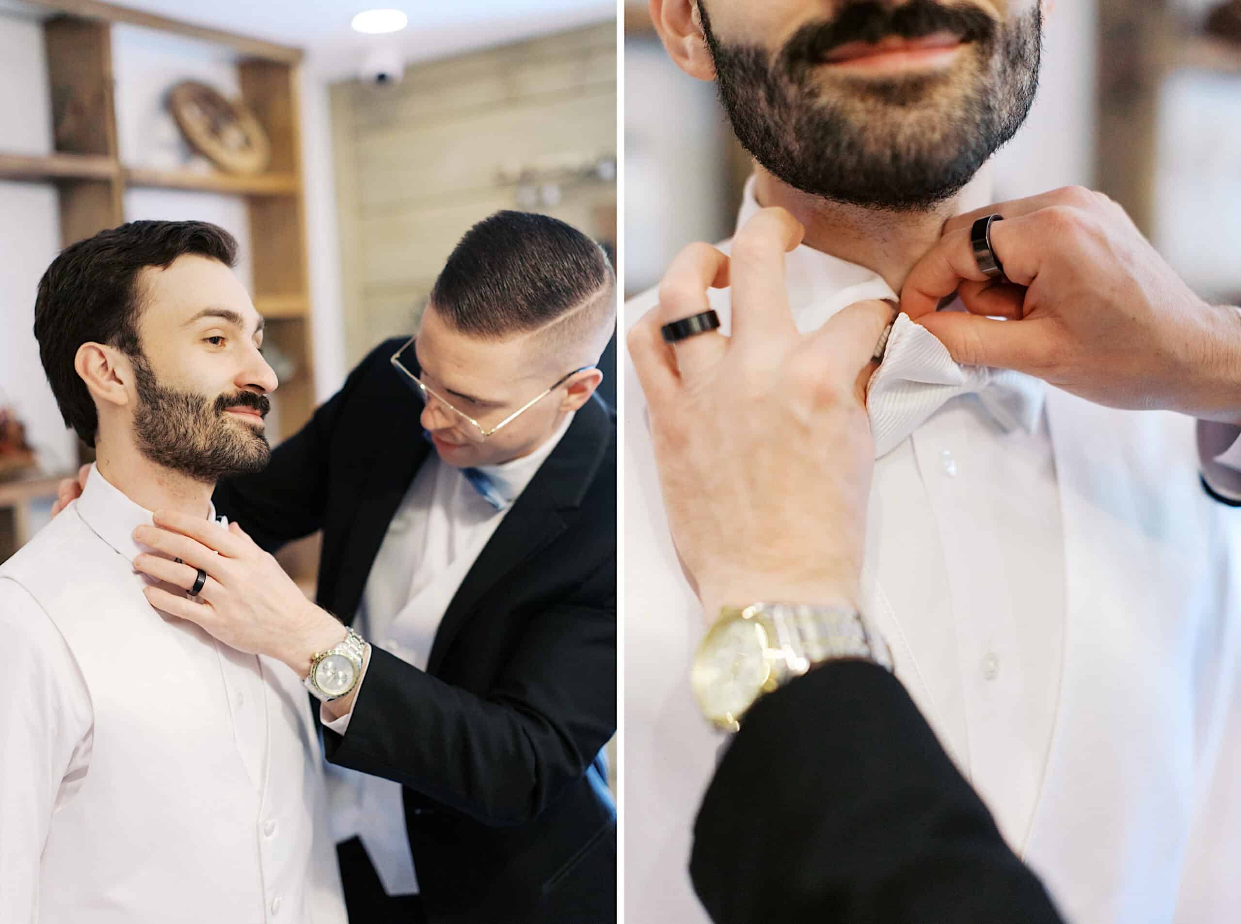 Two men are shown at a beautiful Lochwood Manor wedding; one is adjusting the other’s white bow tie and collar. Both are dressed formally, with close-up focus on the hands fixing the bow tie.
