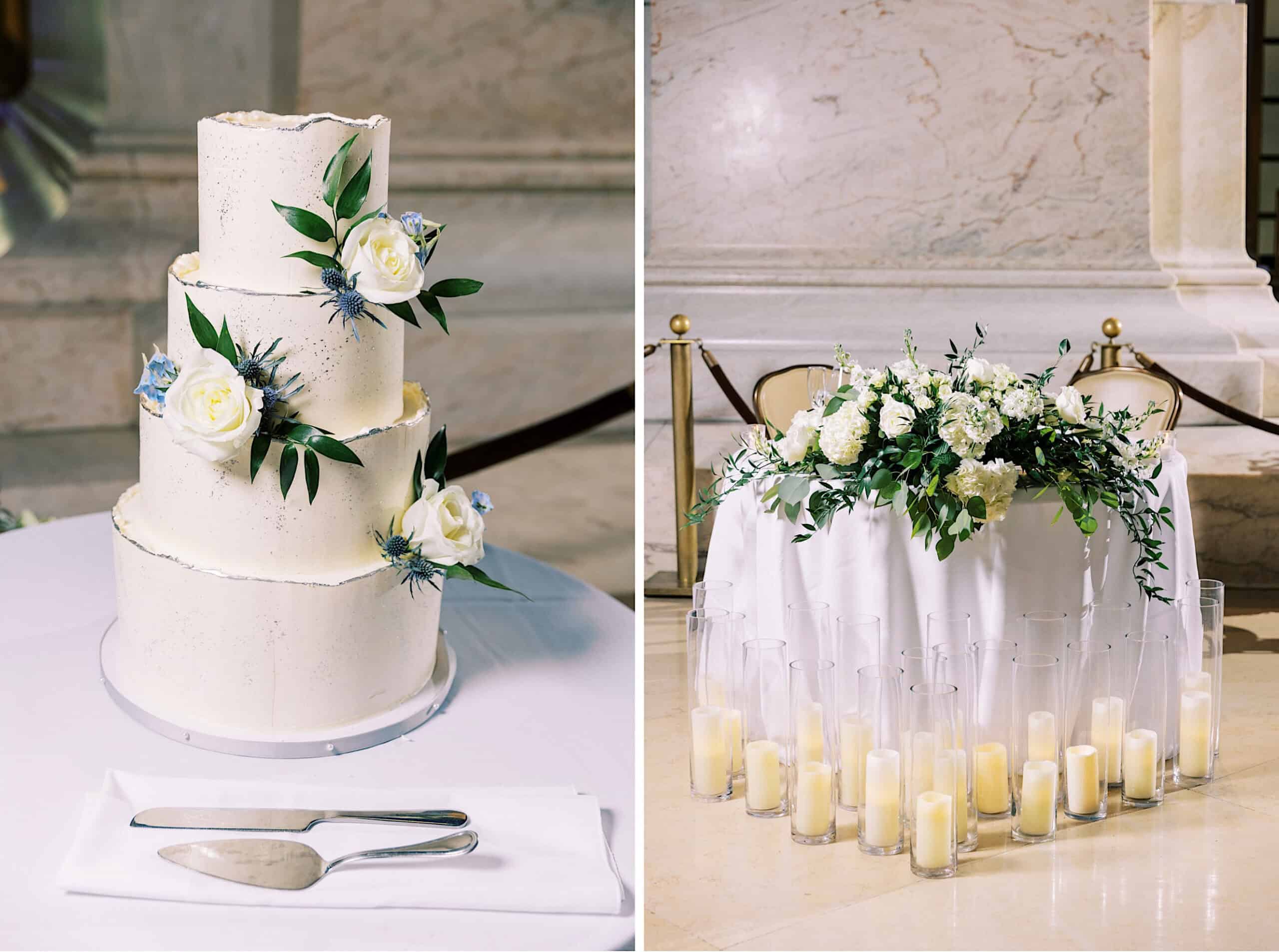 A three-tiered white wedding cake with white and blue flowers is on the left; on the right, a round table at this Franklin Institute wedding is adorned with white flowers and surrounded by lit candles.