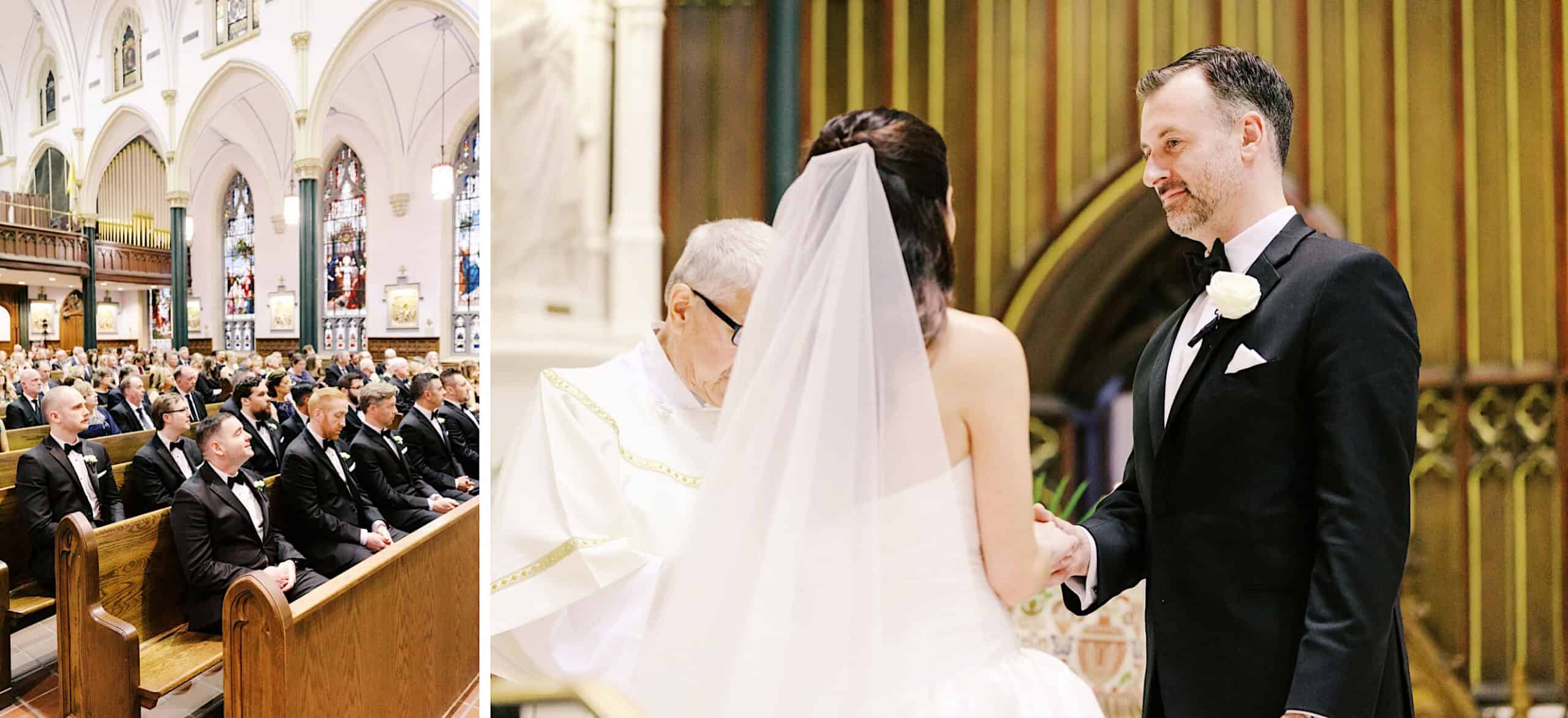 A bride and groom stand at the altar in a church during their wedding ceremony, with a priest officiating and guests seated in the pews, capturing the timeless elegance of a Classic Wedding at Ballroom at the Ben.