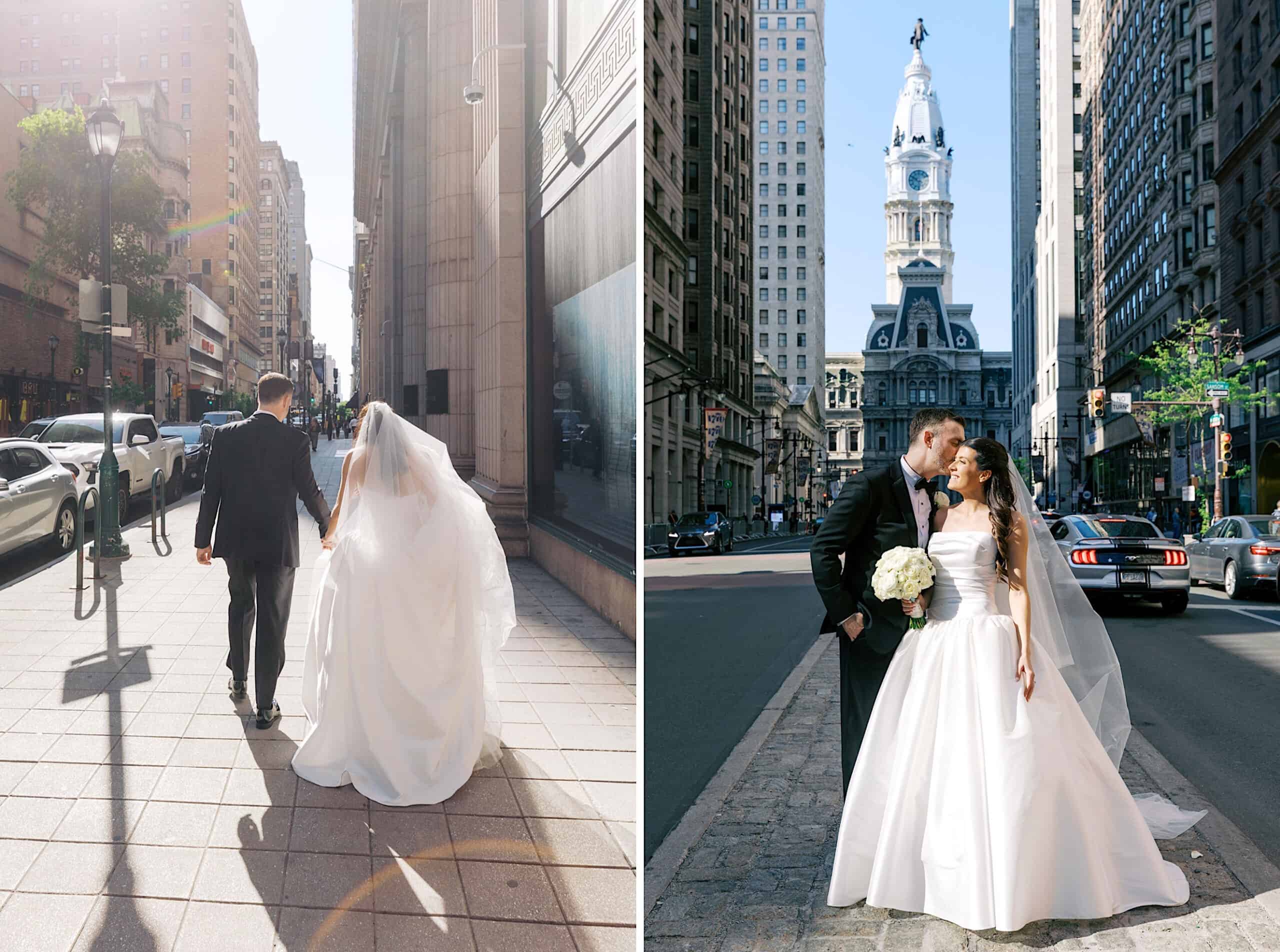 A bride and groom in wedding attire walk through a city street and pose together in front of a historic building with a clock tower, capturing timeless moments from their Classic Wedding at Ballroom at the Ben.