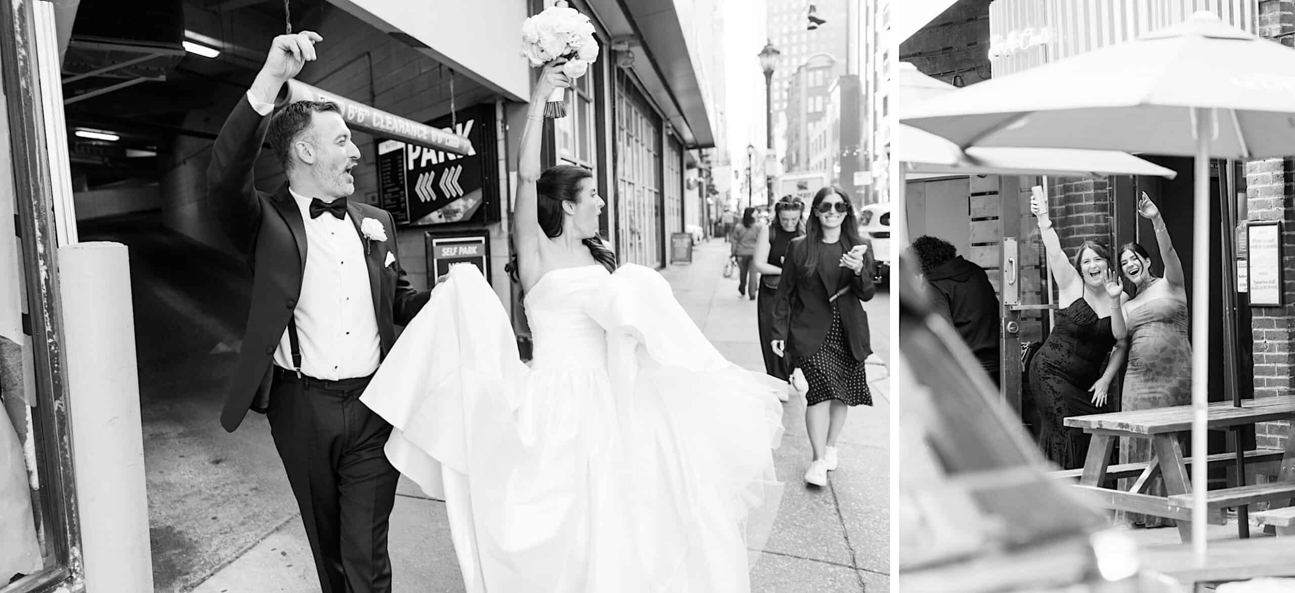 A bride and groom walk joyfully on a city sidewalk, while two women nearby wave and cheer—capturing the timeless spirit of a Classic Wedding at Ballroom at the Ben. The scene is beautifully rendered in black and white.