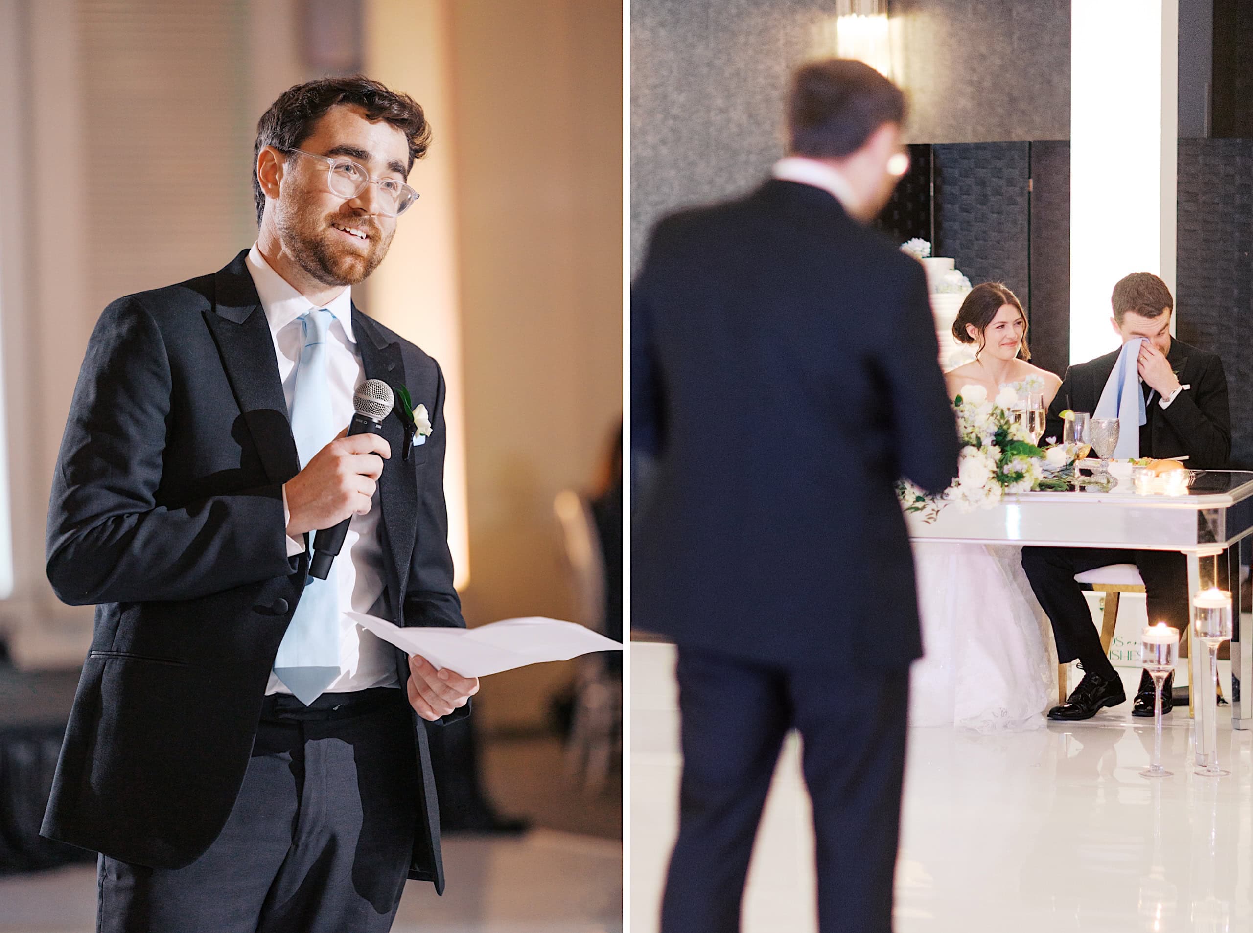 At The Ivy at Ellis Preserve spring wedding, a man in a suit gives a heartfelt speech holding papers, while the bride and groom sit at a table; the groom wipes his eyes.
