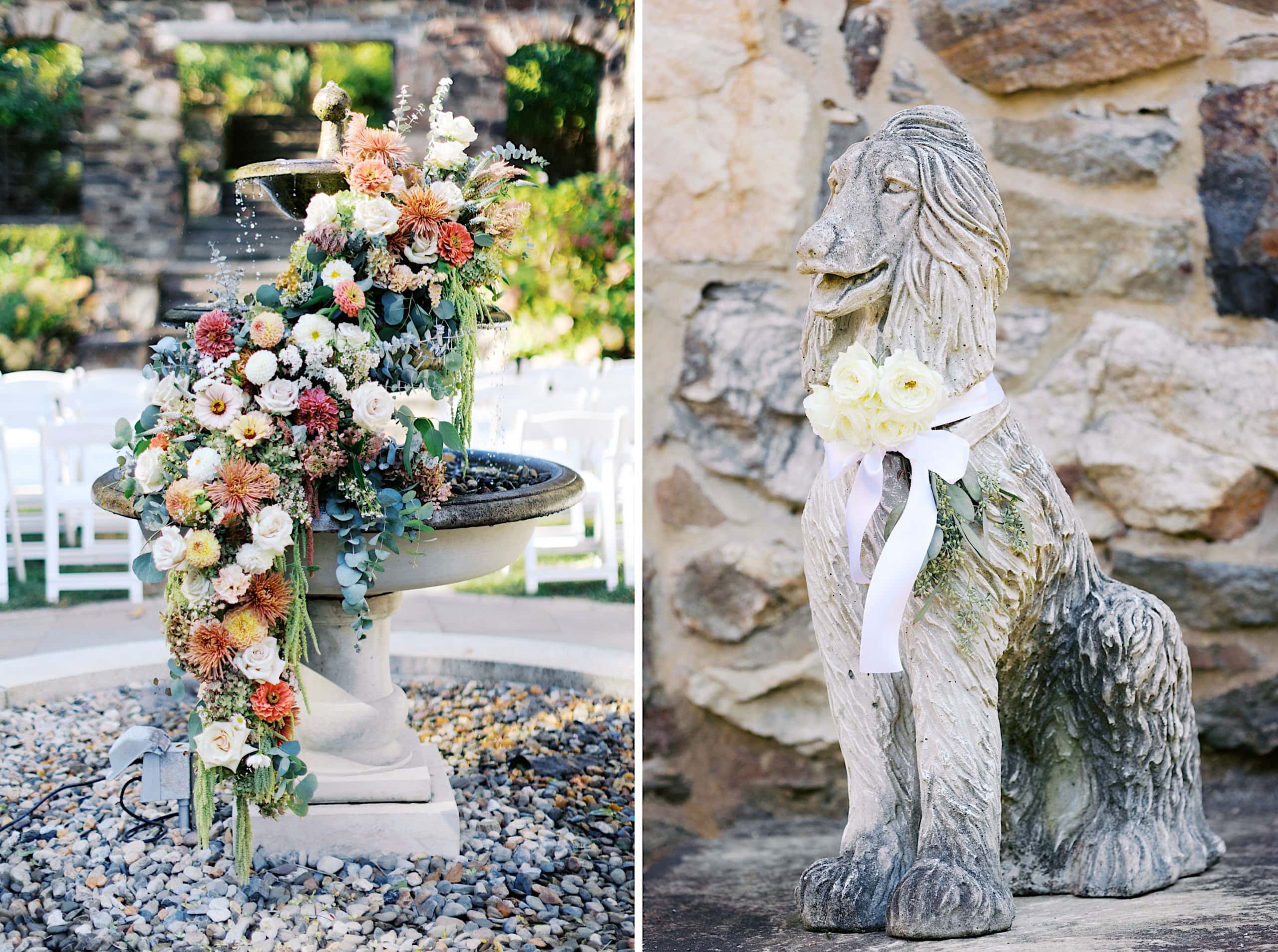 A stone fountain with cascading floral arrangement beside a stone dog statue adorned with white flowers and a ribbon, set outdoors for a picturesque Parque Ridley Creek garden ceremony.