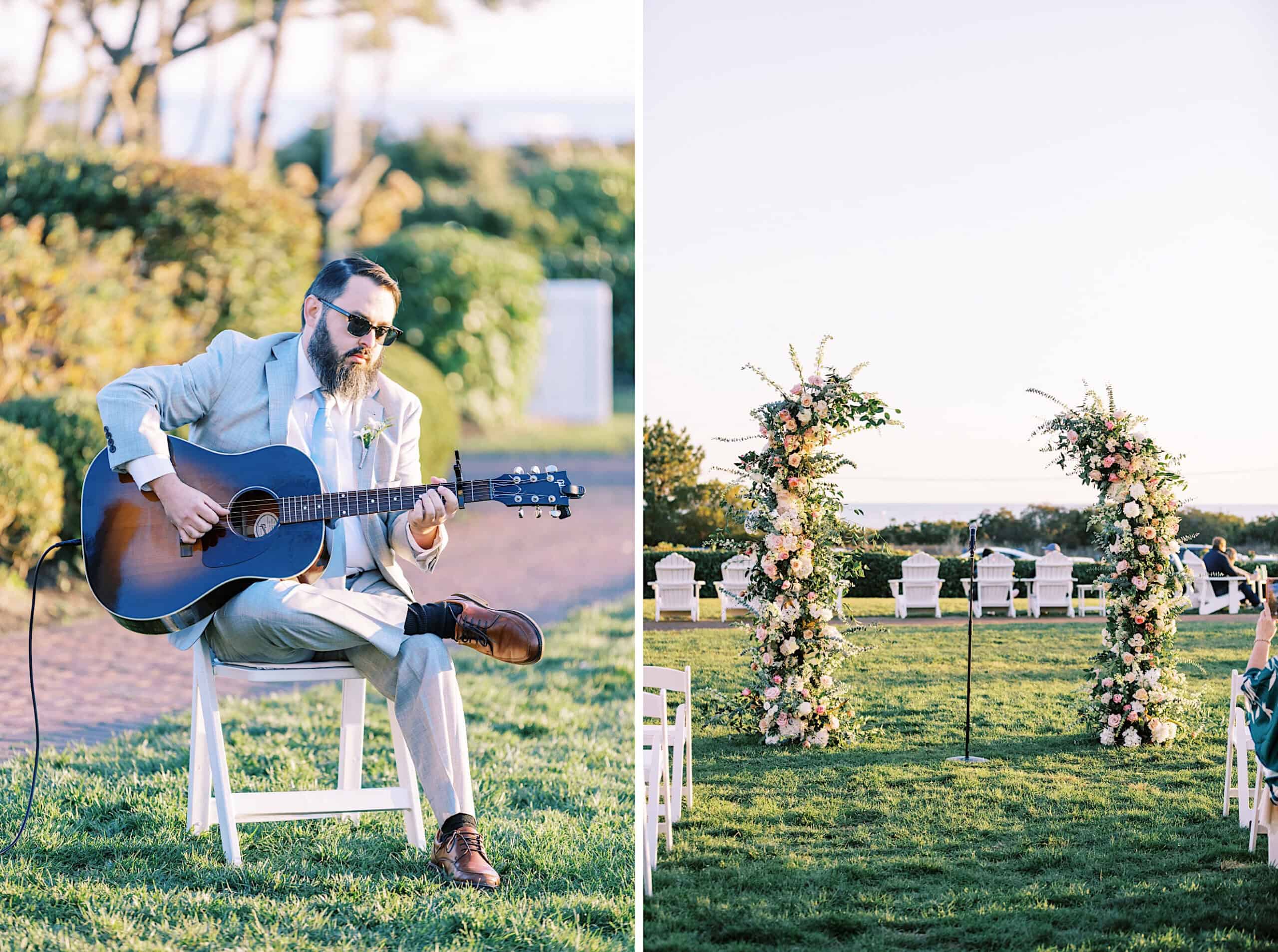 A man in a light suit plays an acoustic guitar outdoors; beside him, two floral wedding arches stand on a grassy lawn under a clear sky at a romantic November wedding at Congress Hall.