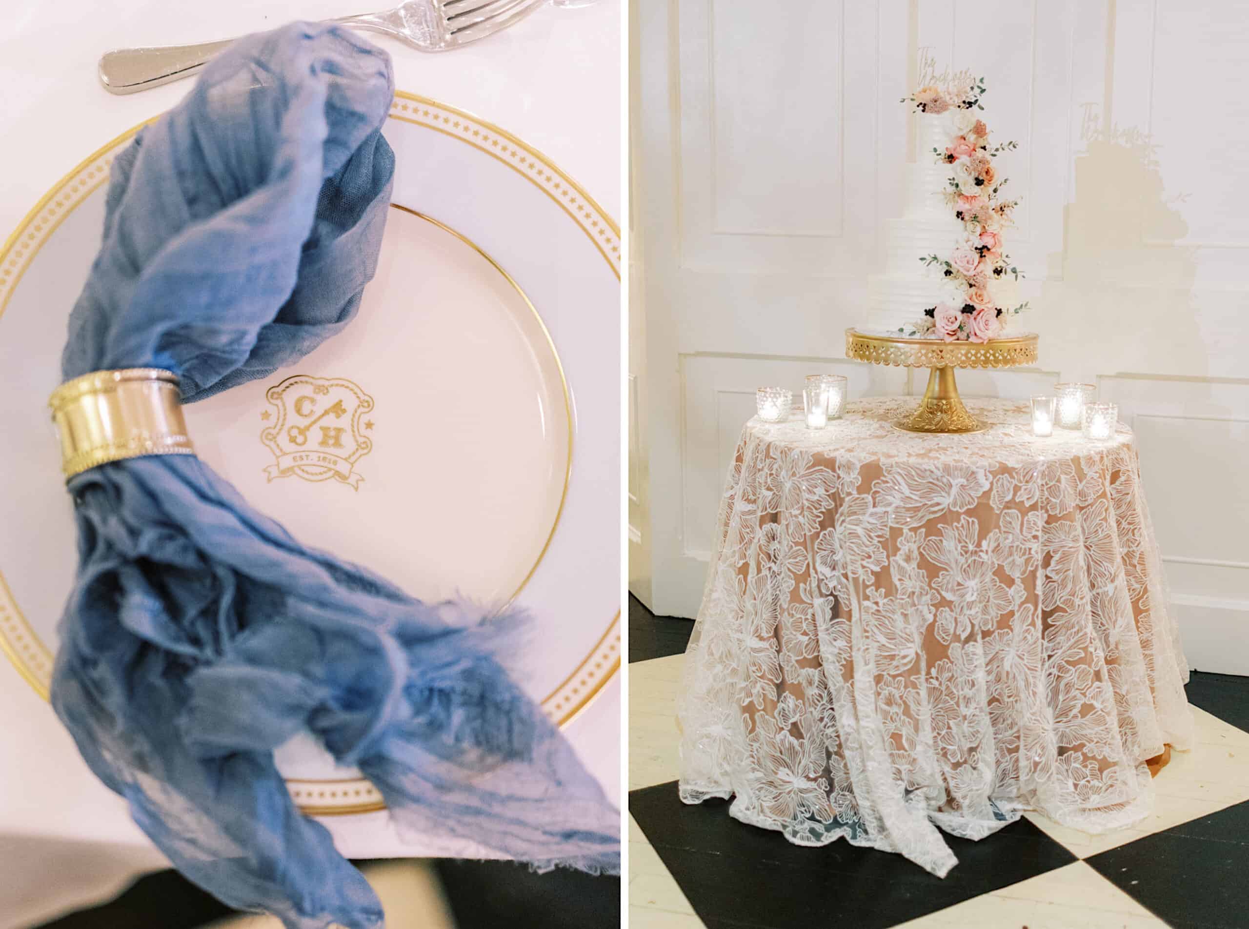 A gold-rimmed plate with a blue napkin sits on the left; on the right, a floral wedding cake on a gold stand graces a lace-covered table with candles—perfect for a romantic November wedding at Congress Hall.